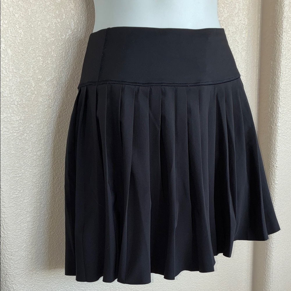 ATHLETA Black Pleated Mini Skirt with built in shorts. L - Picture 3 of 14